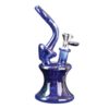 iRie's 7" Tall Blue Natty Bubbler features a built-in showerhead percolator and a removable glass-on-glass pull out. Made from 100% high-quality borosilicate glass.